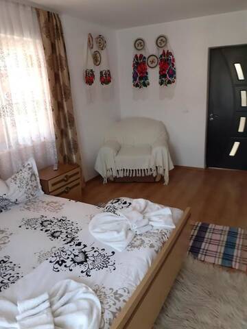 Фото номера Номер с кроватью размера «king-size» Лоджи Pensiunea Rustic Oncesti г. Onceşti 7